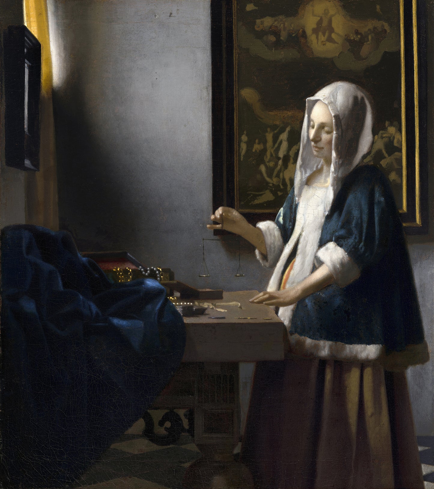 Woman Holding a Balance (c. 1664)